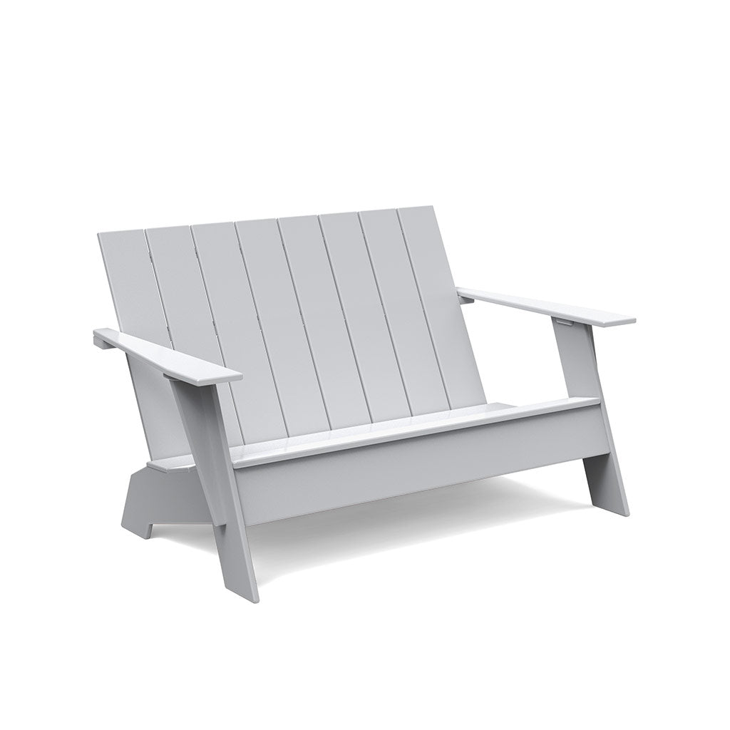 studio shot of driftwood adirondack bench