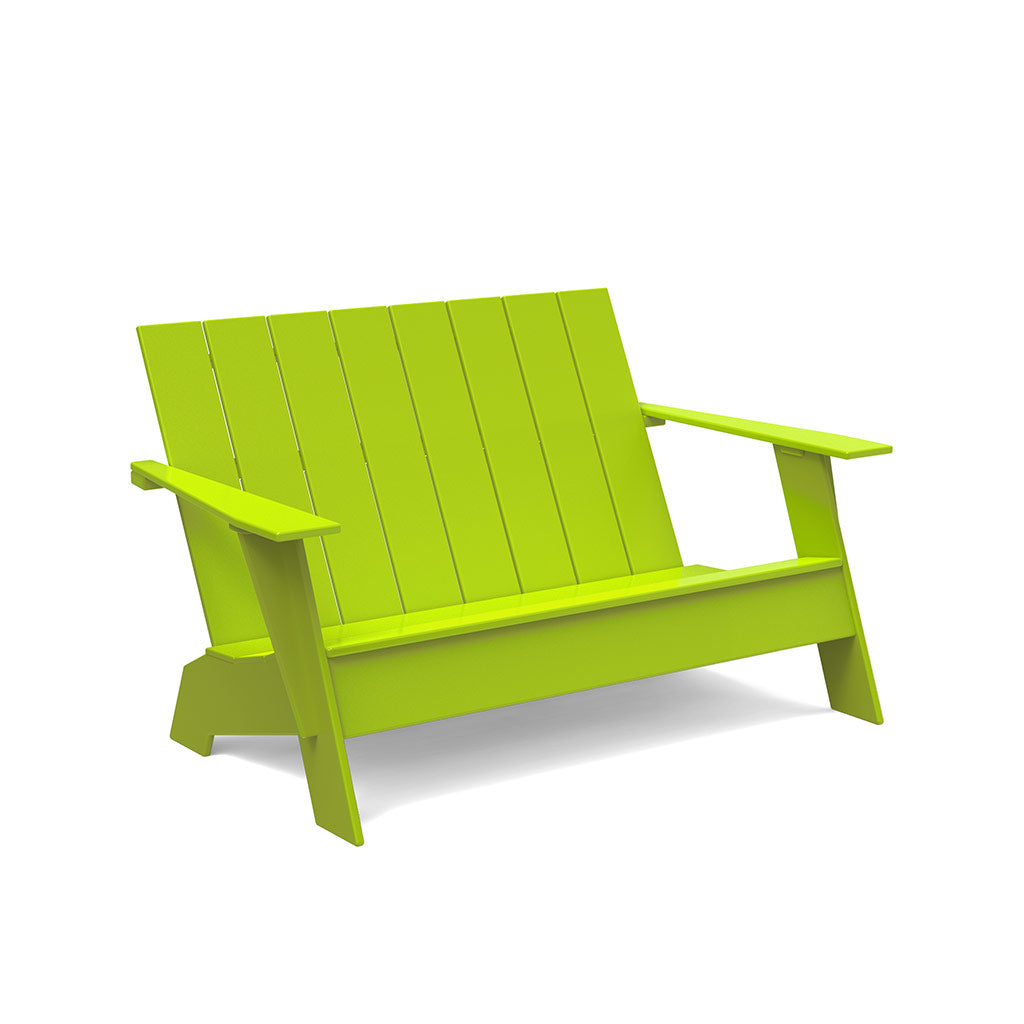 studio shot of leaf green adirondack bench