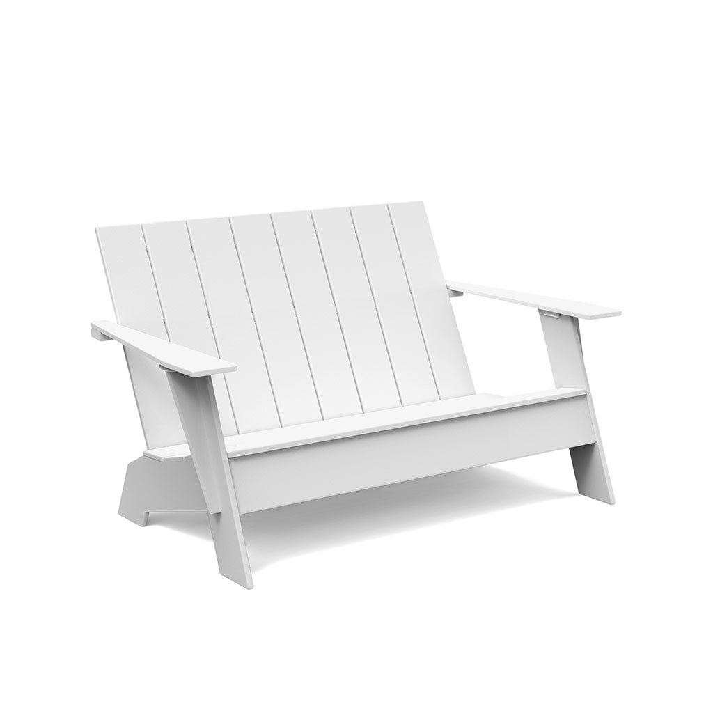 studio shot of white adirondack bench
