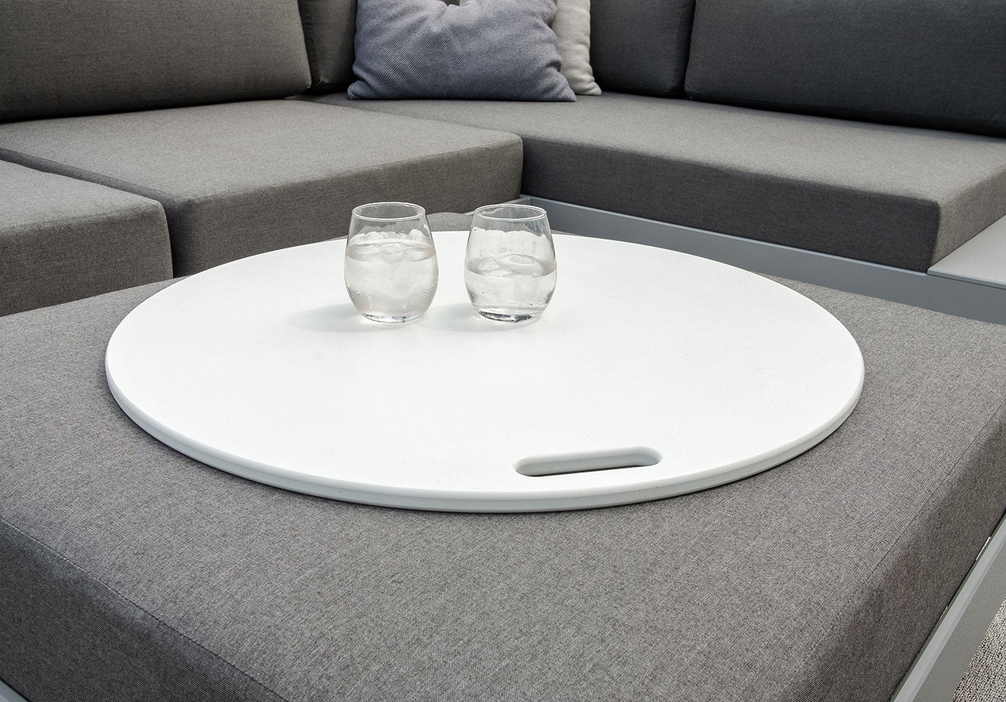 Loll fire ring top used as table on platform one ottoman