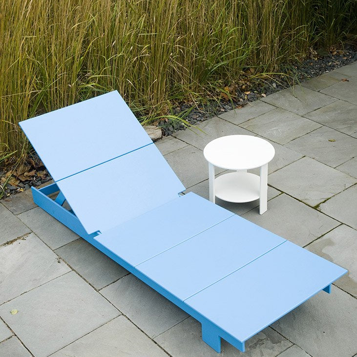 lollygagger chaise sunbed blue stone patio