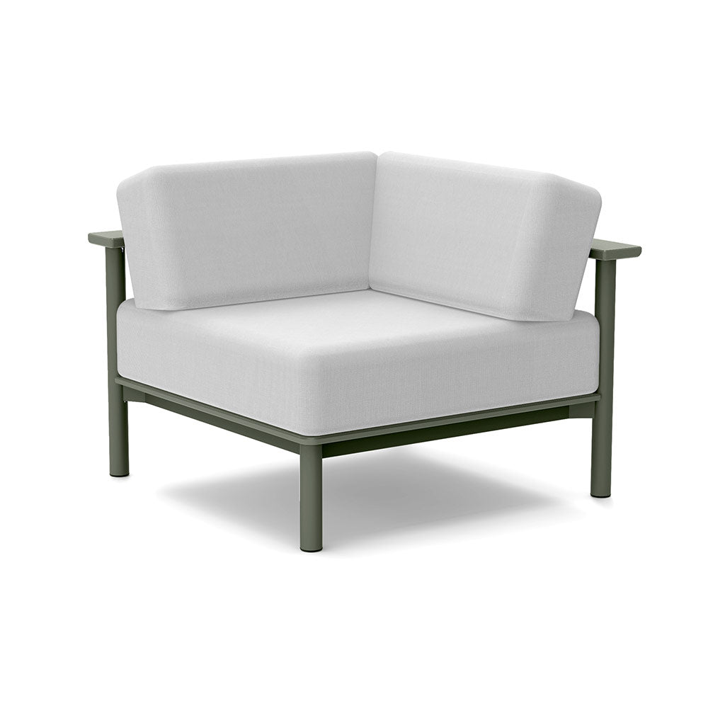 Studio image of a Corner Lounge Chair with Sage frame and Cloud cushions.
