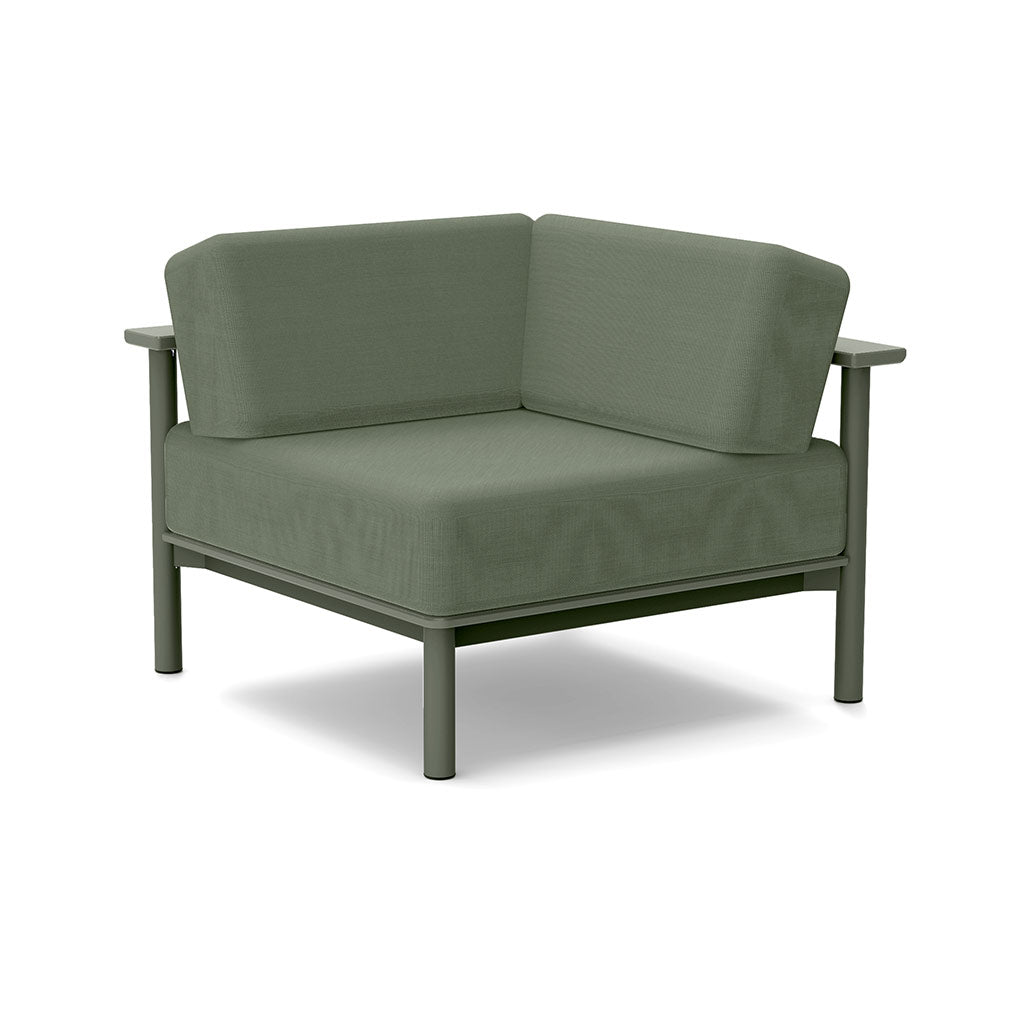 Studio image of a Corner Lounge Chair with Sage frame and Fern cushions.