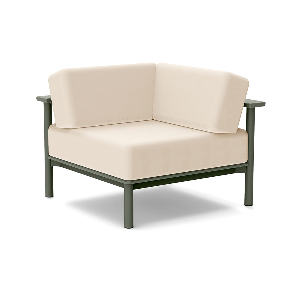 Studio image of a Corner Lounge Chair with Sage frame and Flax cushions.