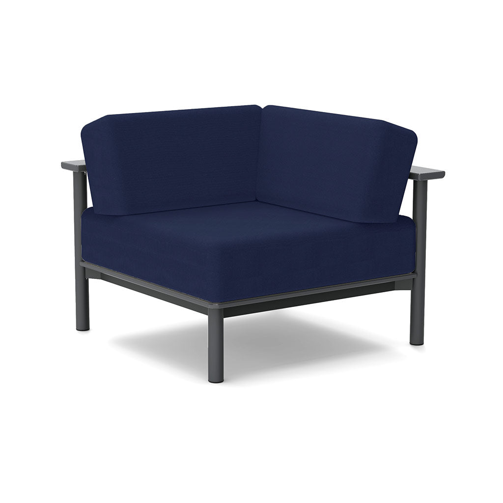 Studio image of a Corner Lounge Chair with Charcoal frame and Navy cushions.