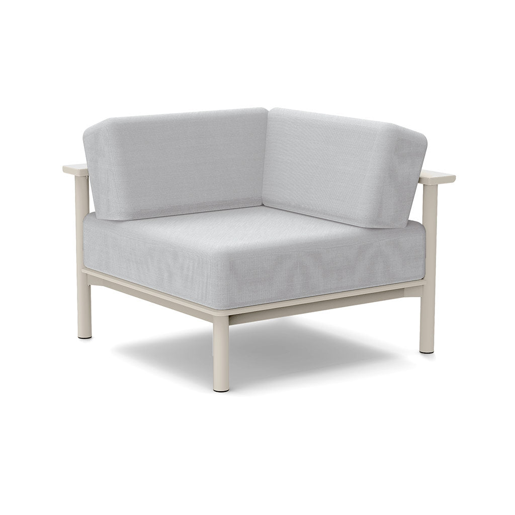 Studio image of a Corner Lounge Chair with Fog frame and Silver cushions.