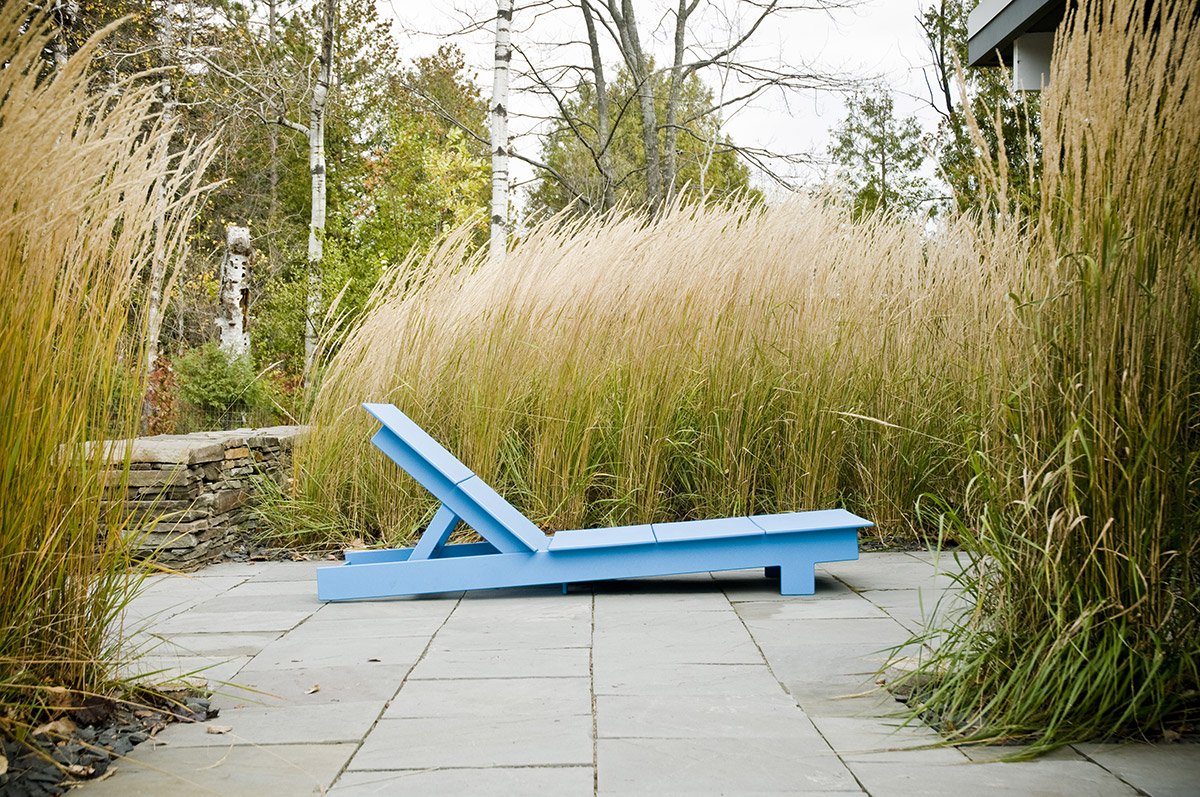lollygagger chaise sunbed blue stone patio