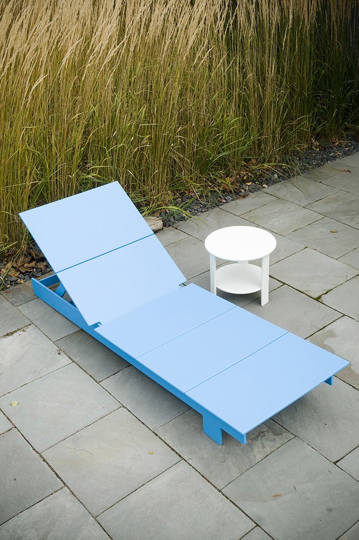 lollygagger chaise sunbed blue stone patio