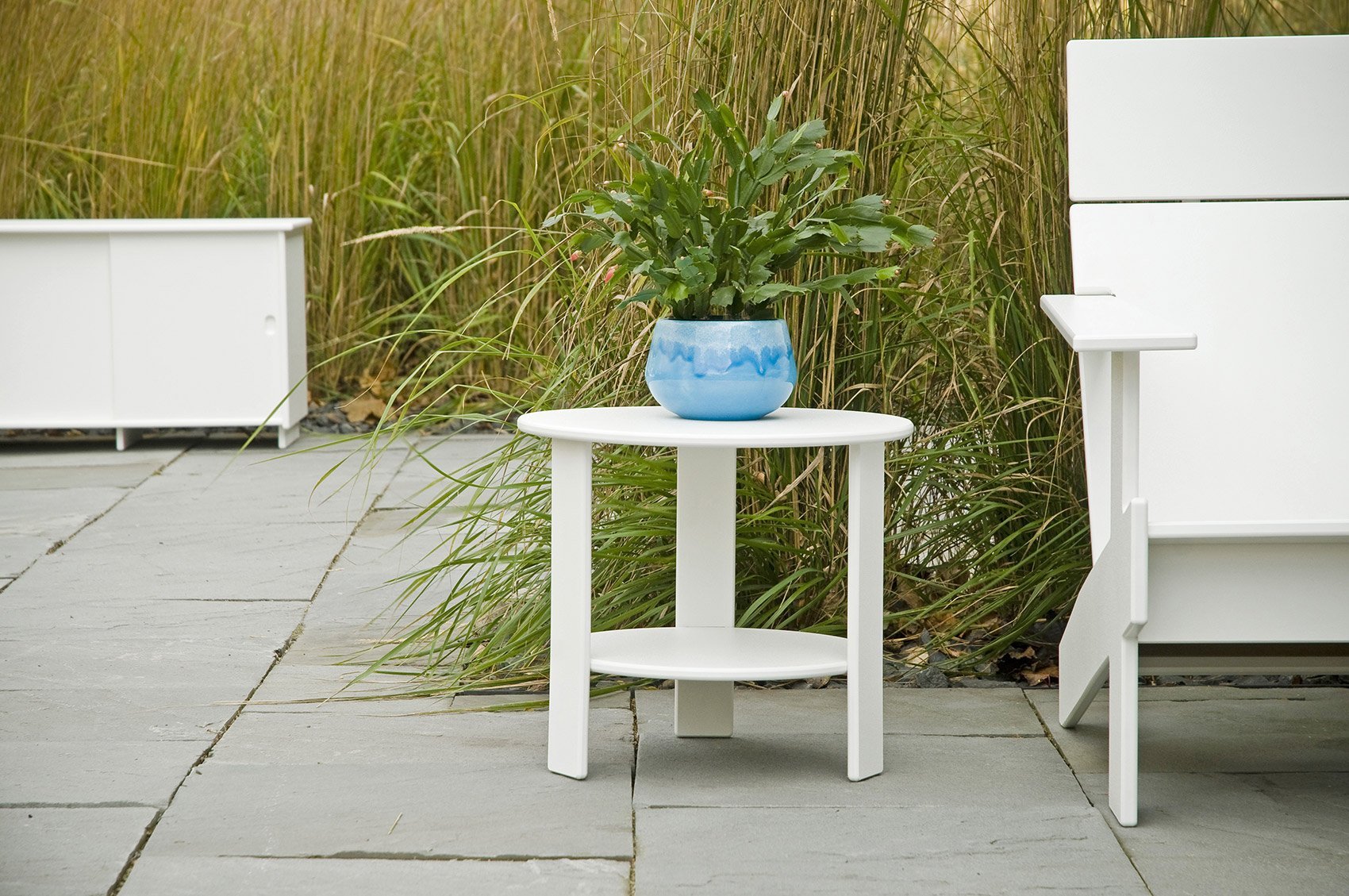 lollygagger modern side table stone patio
